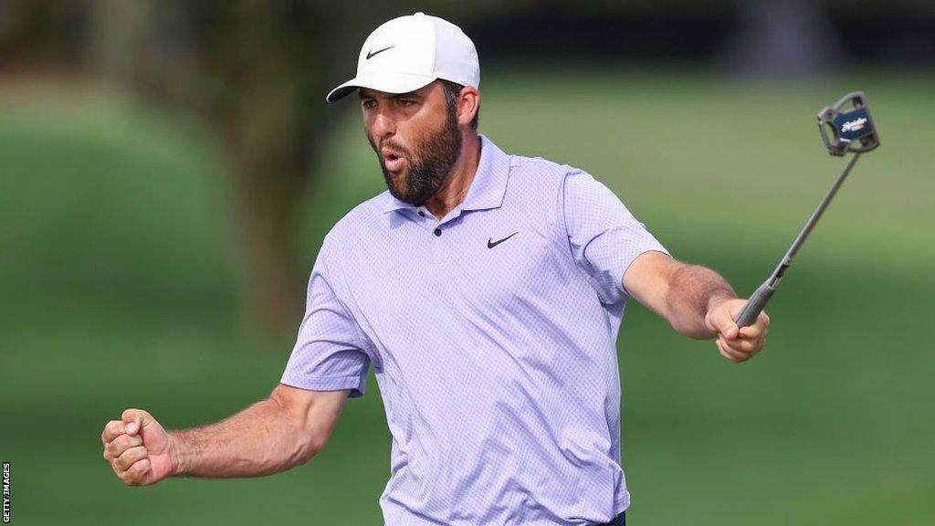 Scottie Scheffler reacts after making a birdie