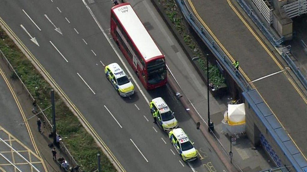 Police at the scene of a stabbing where a 15-year-old girl was killed