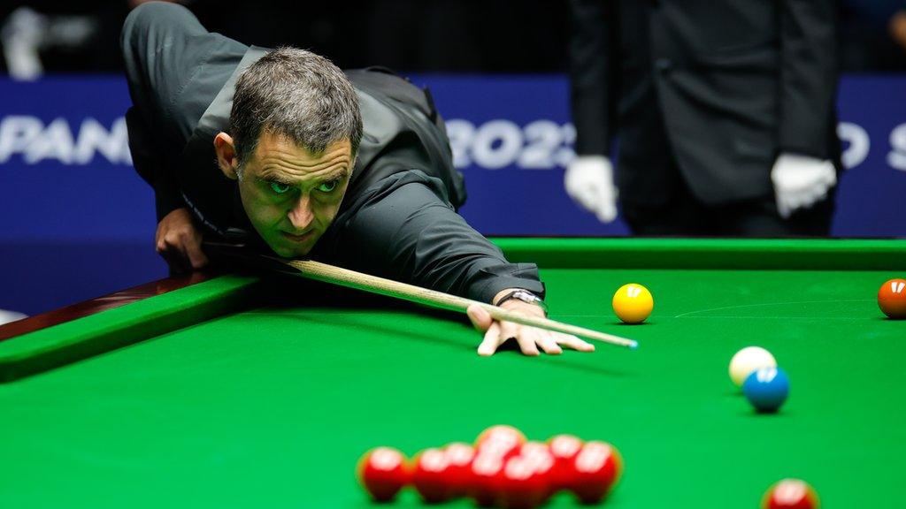 Ronnie O'Sullivan hitting a shot at the Wuhan Open