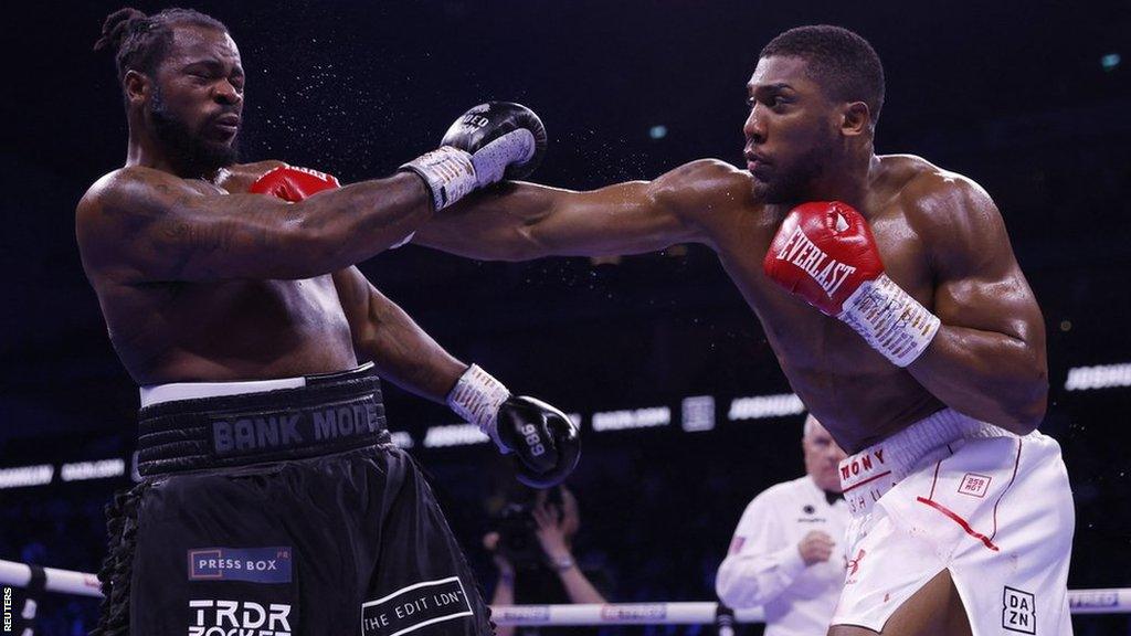 Anthony Joshua punches Jermaine Franklin