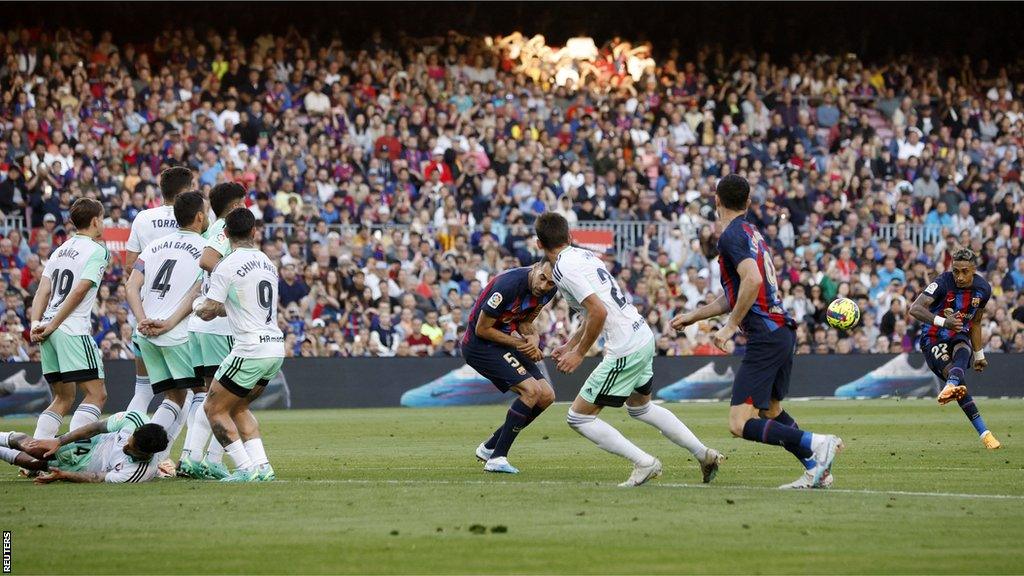 Barcelona's Raphinha goes close to scoring from a free kick against Osasuna in La Liga