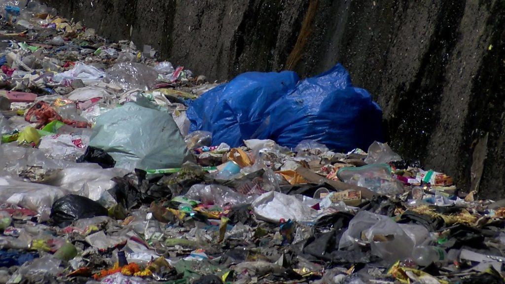 Canal full of plastic bags