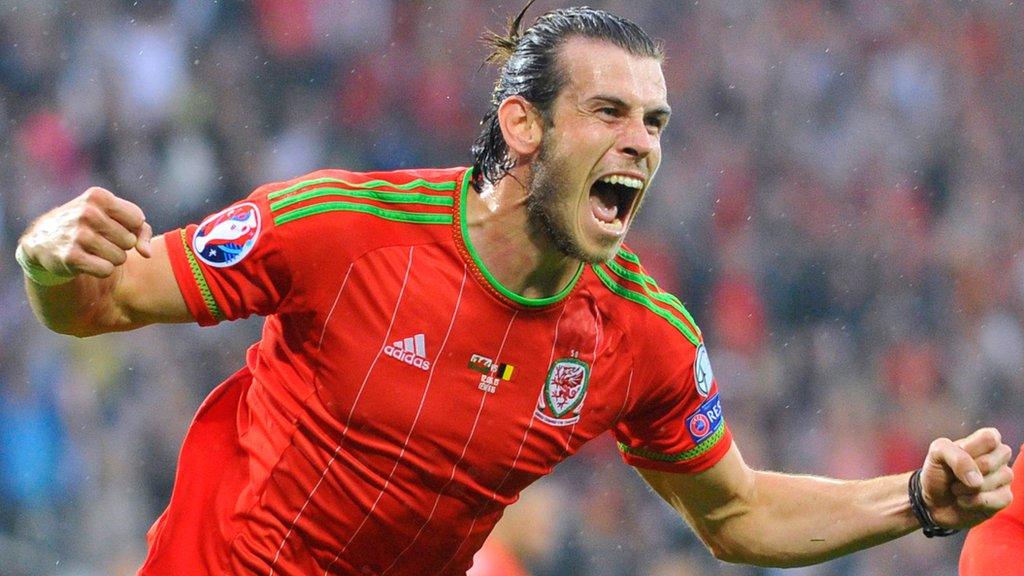 Gareth Bale celebrates after scoring the first goal for Wales