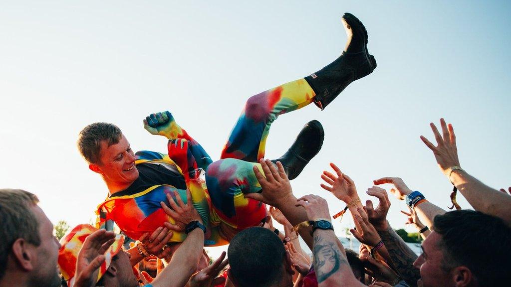 Crowdsurfing at the main stage on Friday