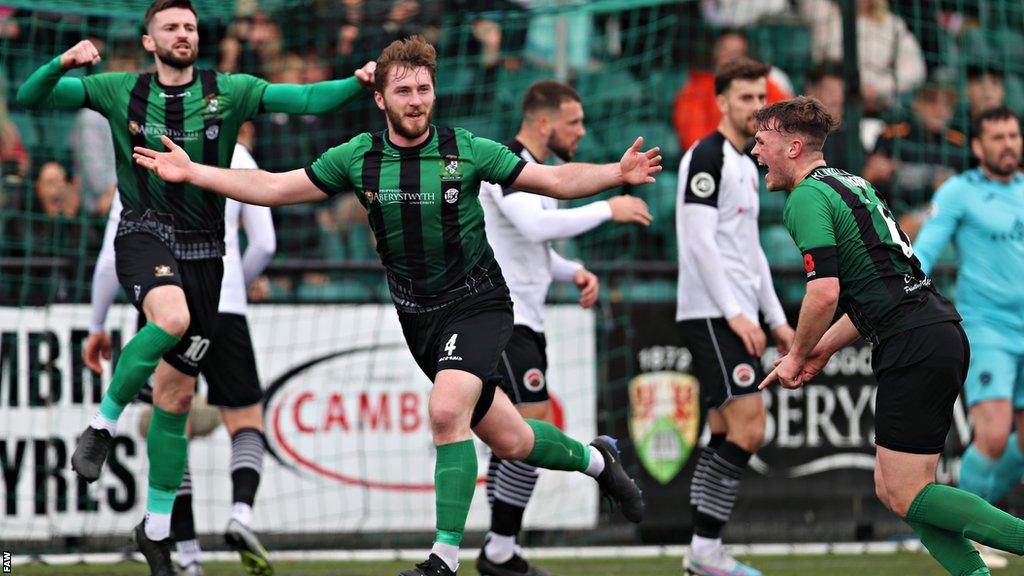 Louis Bradford celebrates his goal