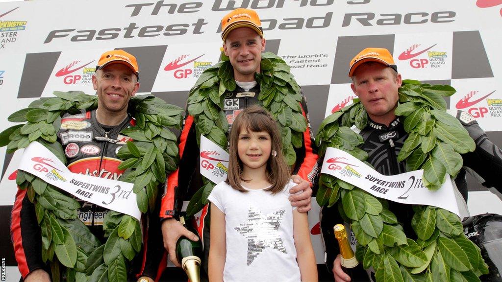 Ryan Farquhar on the top step of the podium in 2011