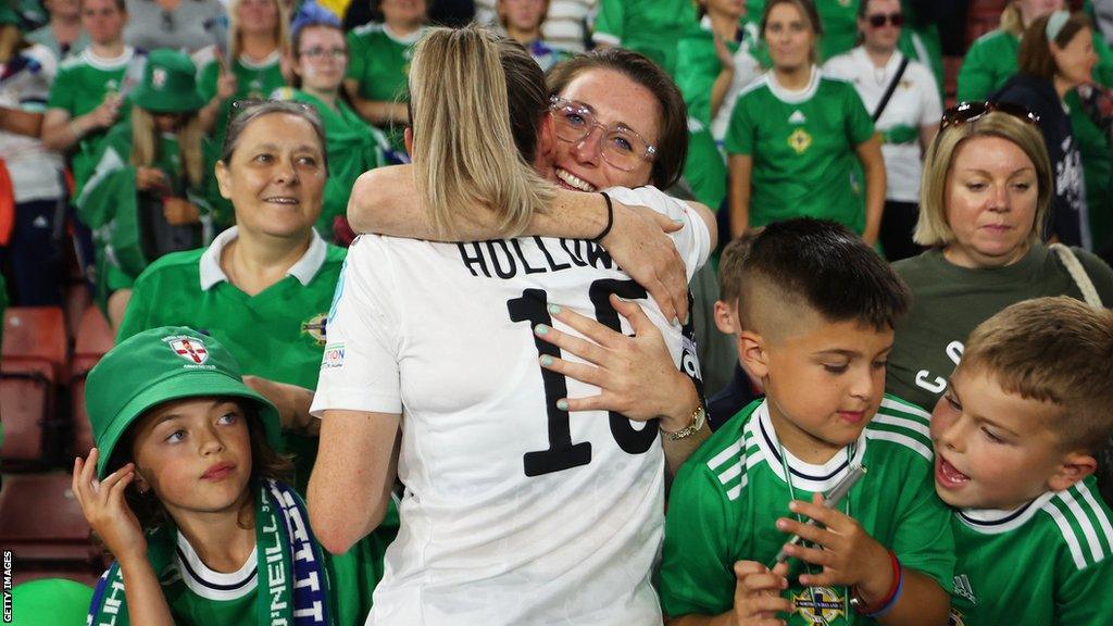 Lucy Quinn hugs Rebecca Holloway