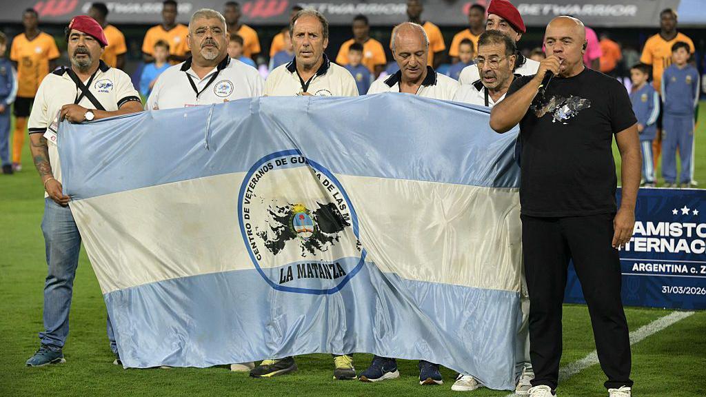 Argentine Falklands War veterans sing the national anthem before a friendly football match between Argentina and Zambia at La Bombonera stadium in Buenos Aires in March 2026