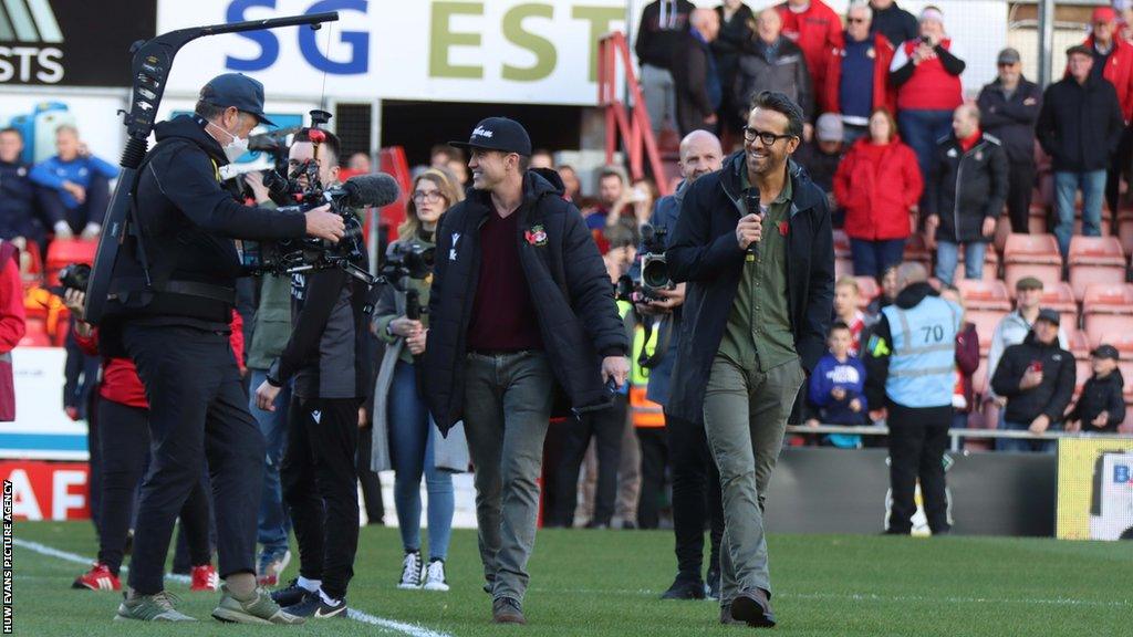 Ryan Reynolds and Rob McElhenny make their visit to the Racecourse Ground