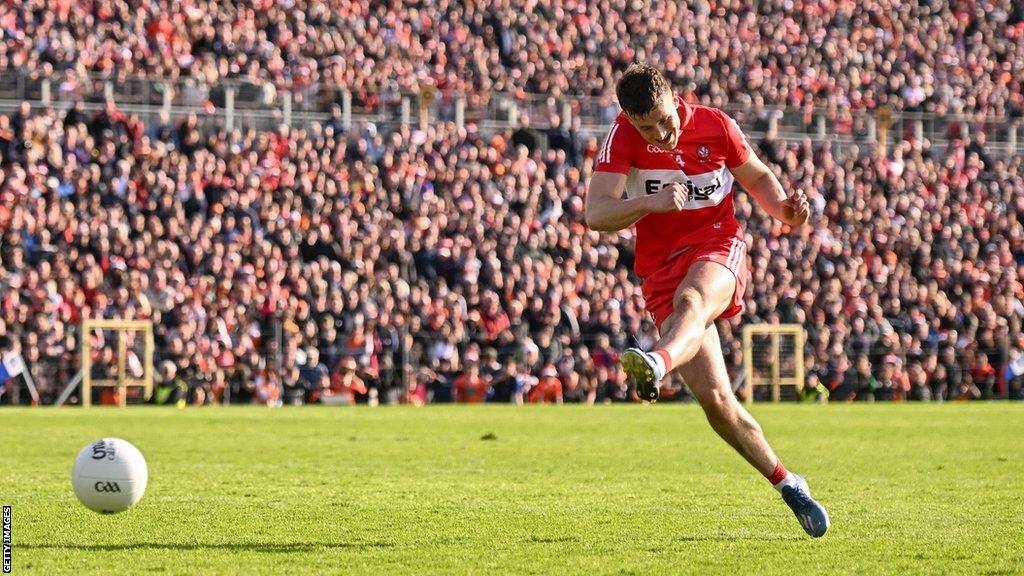 Shane McGuigan scores his penalty