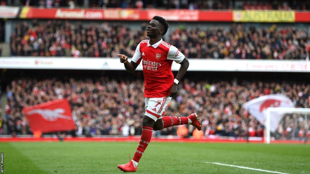 Bukayo Saka celebrates scoring against Crystal Palace in March