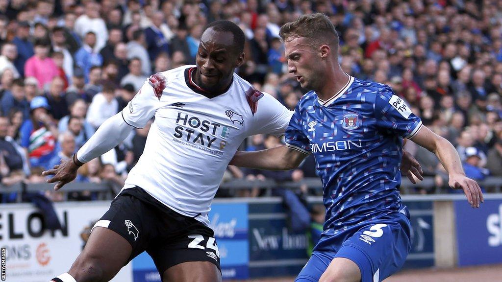 Ryan Nyambe (left) in action for Derby County on his debut