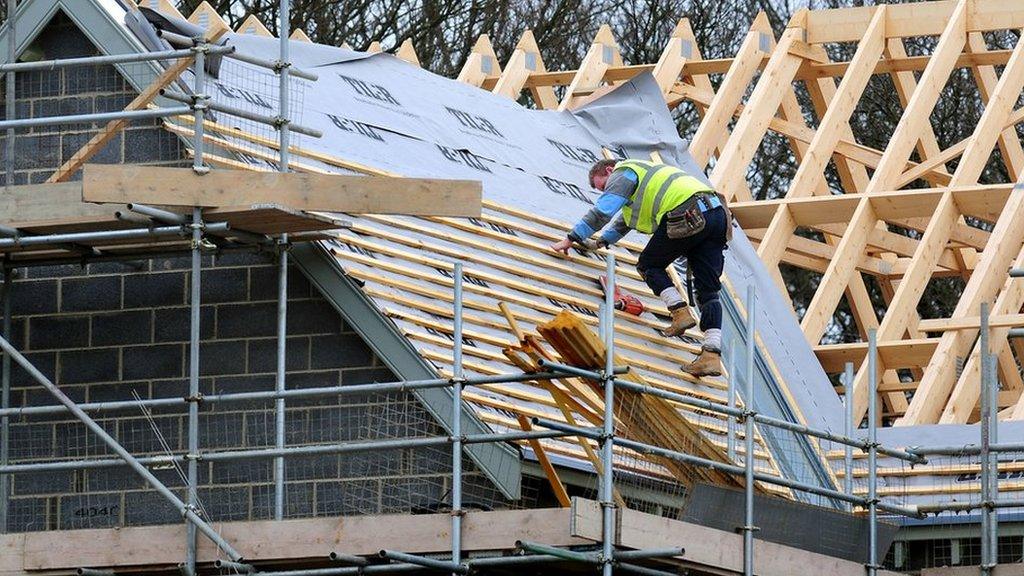 Builder working on a roof