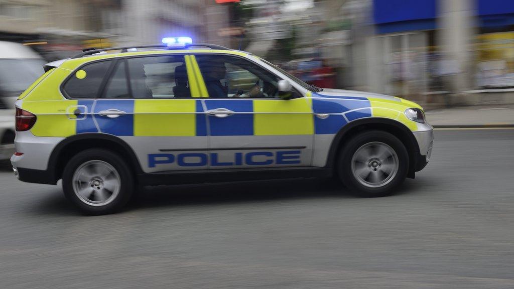 A speeding police car (stock photograph)