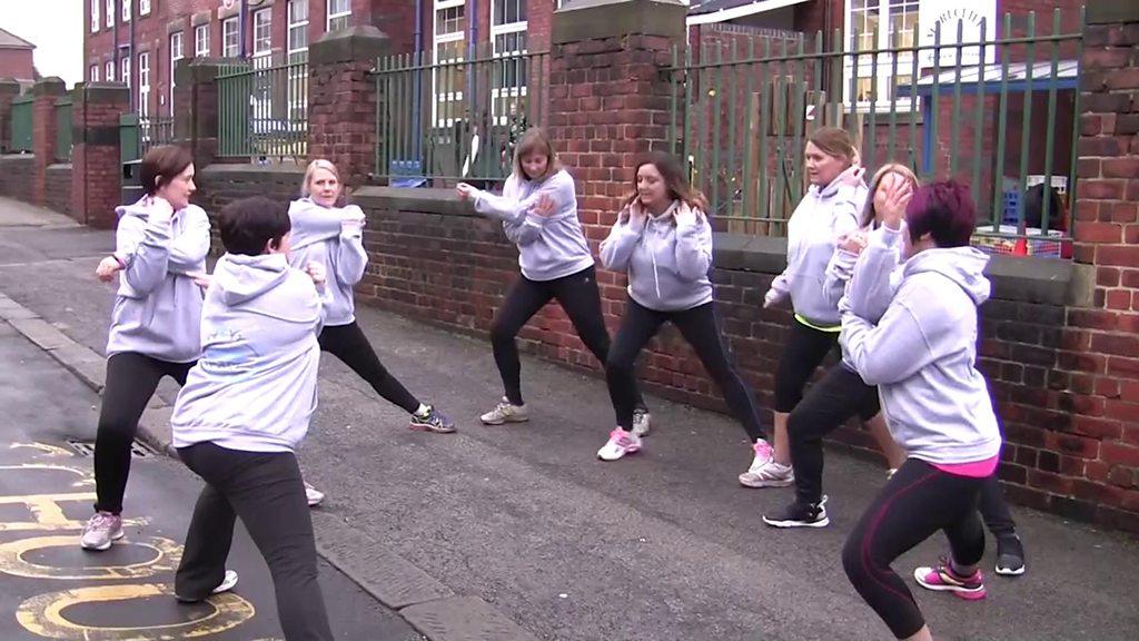 Mums' Team members stretching