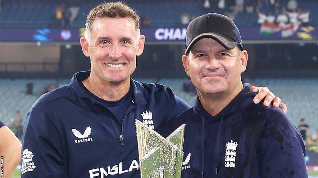 Mike Hussey and Matthew Mott celebrate winning the men's T20 World Cup