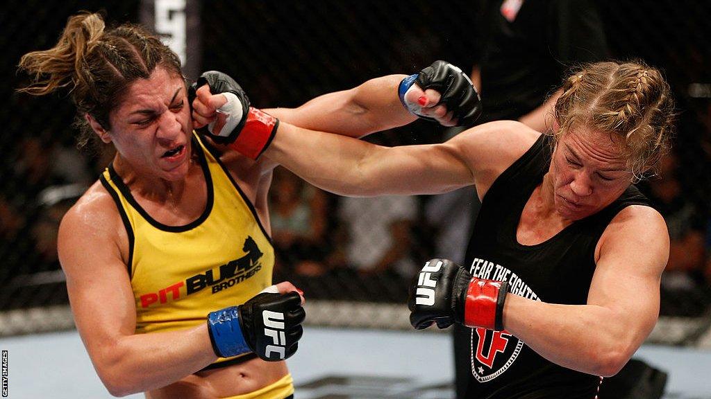 Julie Kedzie lands a punch on Bethe Correia