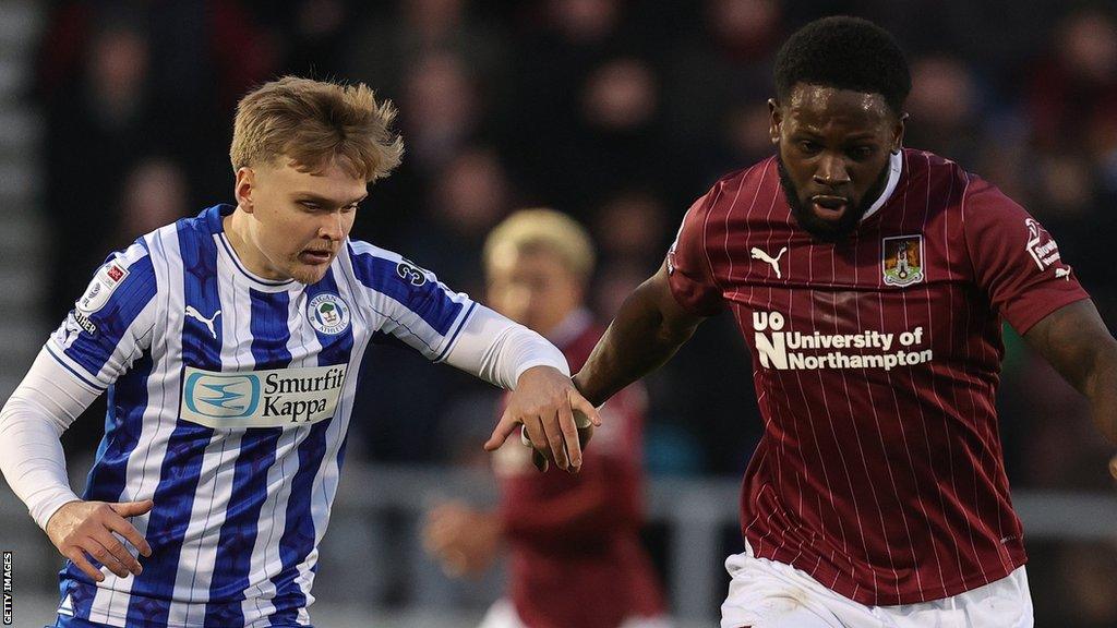 Tyreece Simpson (right) playing against Wigan