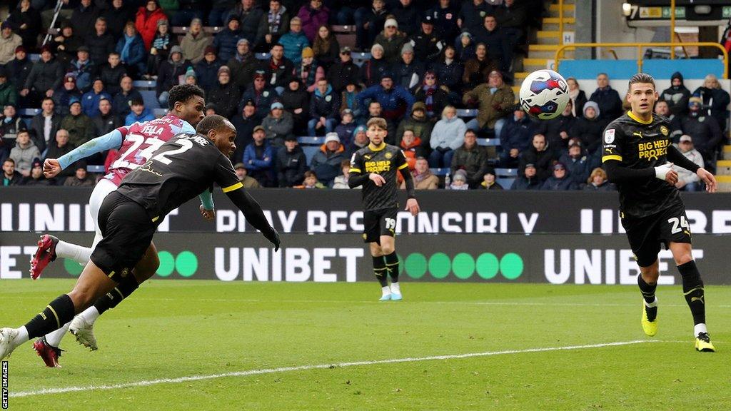 Nathan Tella opens the scoring for Burnley against Wigan