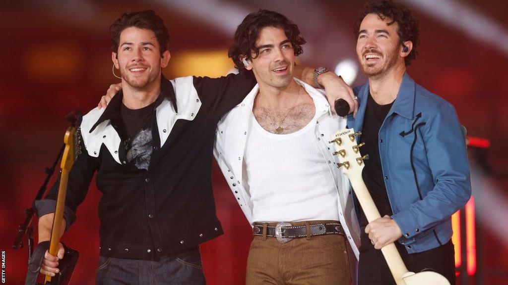 The Jonas Brothers after playing the half-time show at the Dallas Cowboys' Thanksgiving game in 2022