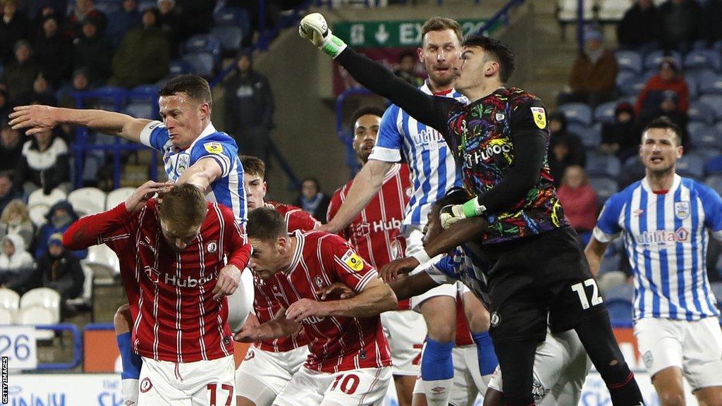 Huddersfield tussle for a corner in the Bristol City penalty area