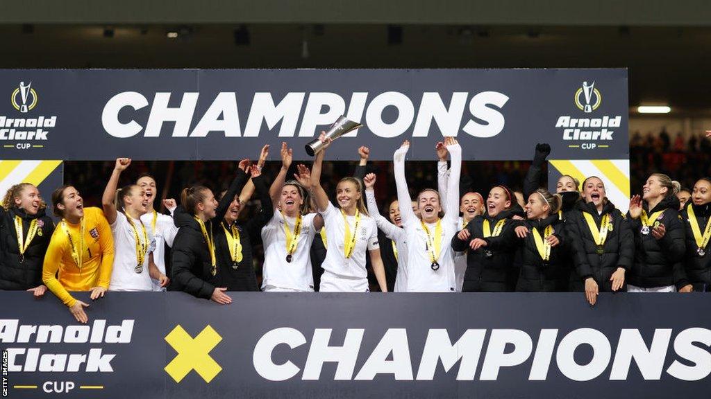 England players celebrate their Arnold Clark Cup victory