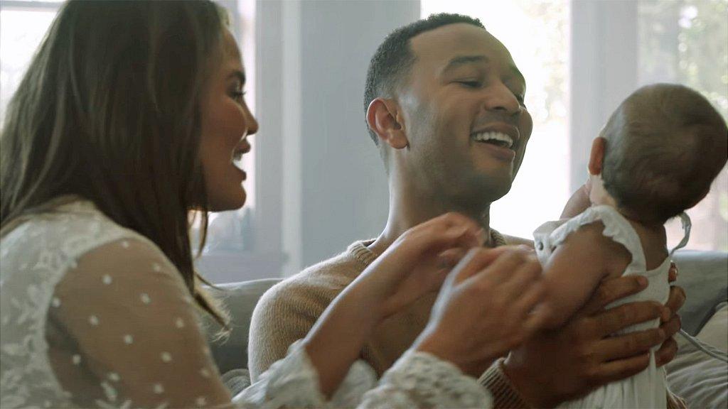 Chrissy Teigen, John Legend and their daughter, Luna, in the video for Love Me Now