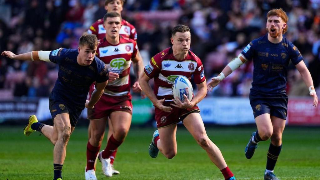 Wigan romp to 10-try win over spirited Salford