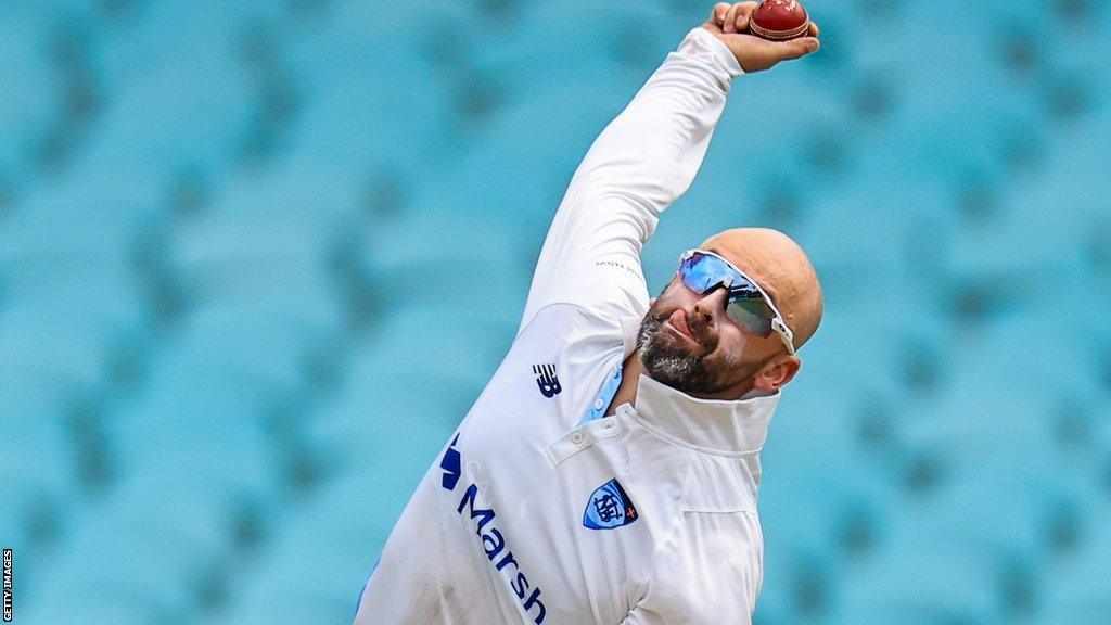 Nathan Lyon in action for New South Wales