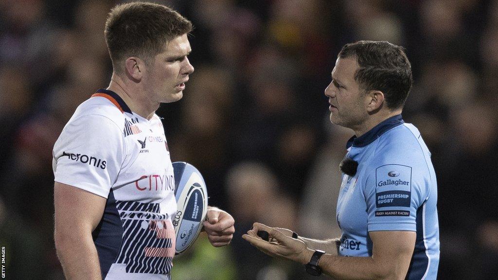 Saracens fly-half Owen Farrell and referee Karl Dickson