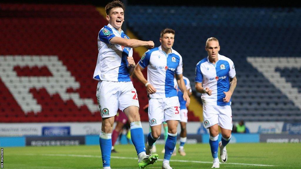 Andrew Moran celebrates scoring his side's third goal