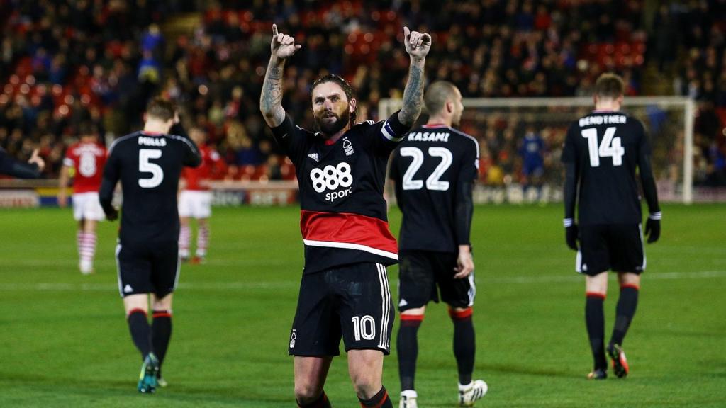 Henri Lansbury celebrates