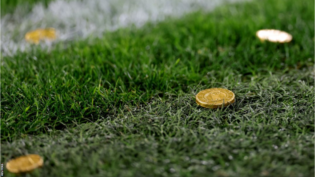 Chocolate gold coins were thrown on to the pitch during the Dortmund v Freiburg match