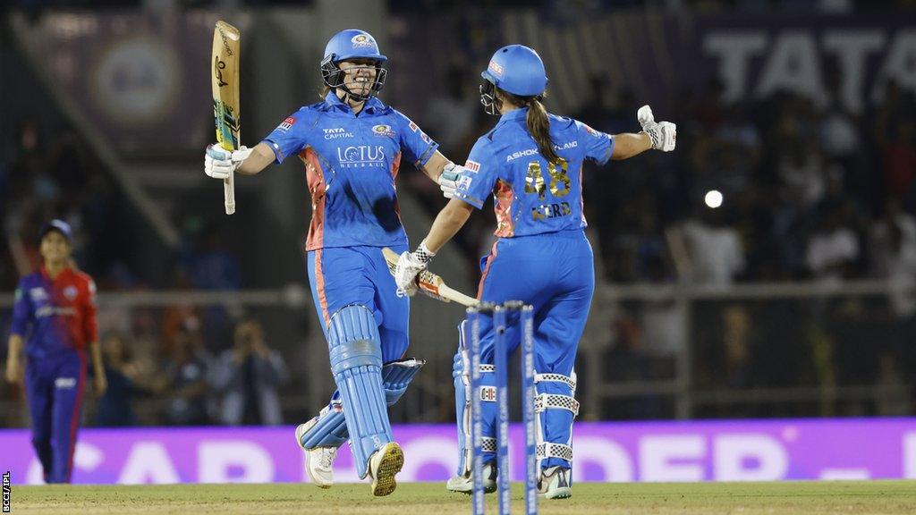 Nat Sciver-Brunt and Amelia Kerr celebrate winning the WPL