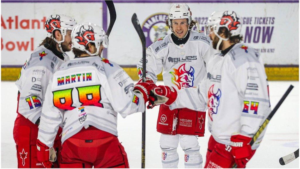 Cardiff Devils players celebrate at Manchester