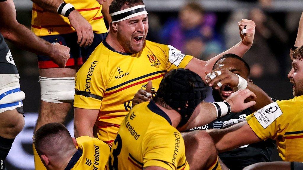 Rob Herring celebrates as Nick Timoney crashes over for Ulster's fourth try