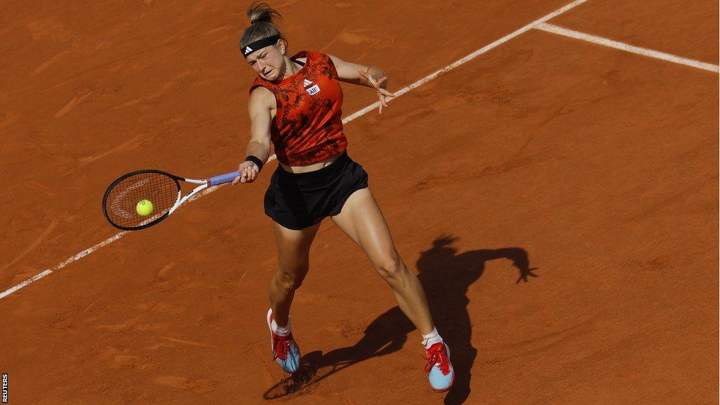 Karolina Muchova hits a return against Aryna Sabalenka in the 2023 French Open semi-finals