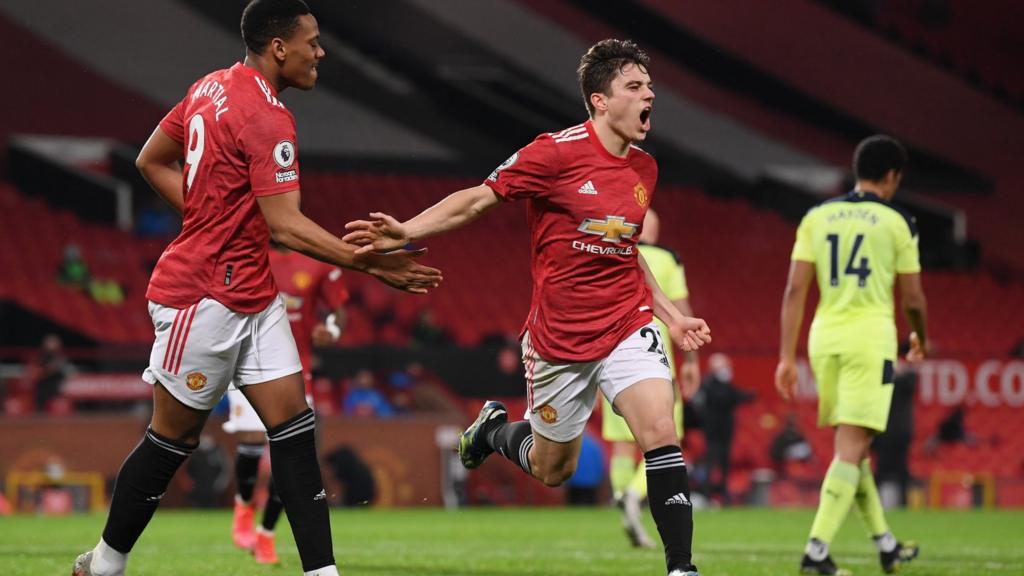 Daniel James celebrates