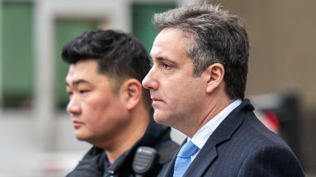 Michael Cohen leaves court after sentencing