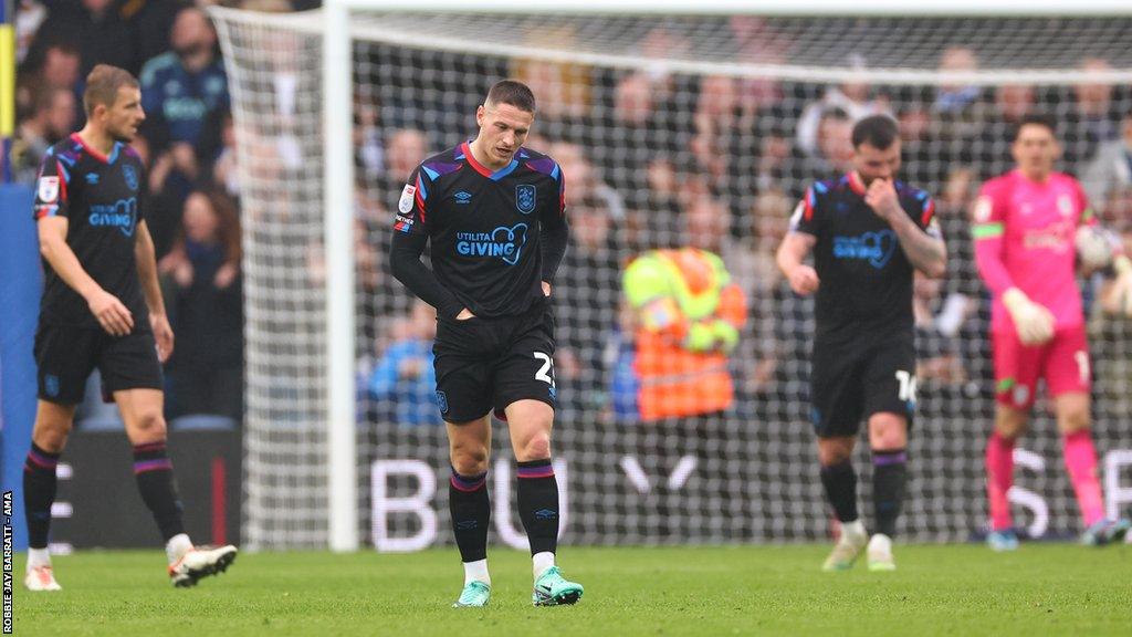 Huddersfield defenders look dismayed