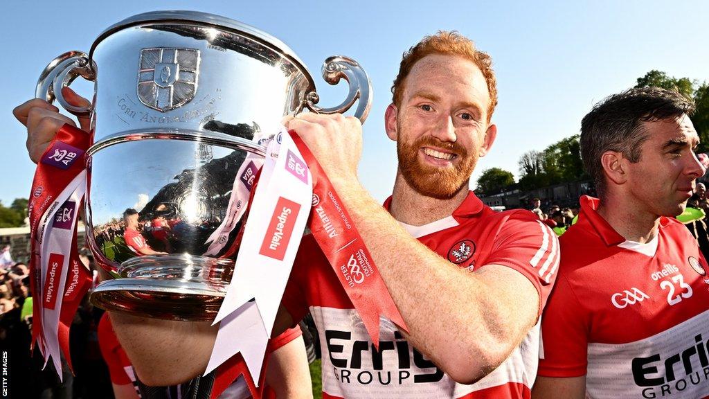 Conor Glass poses with the Anglo-Celt Cup