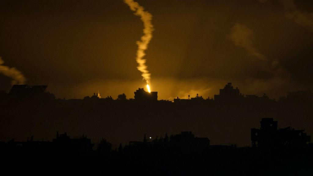 A flare lights up the Gaza skyline