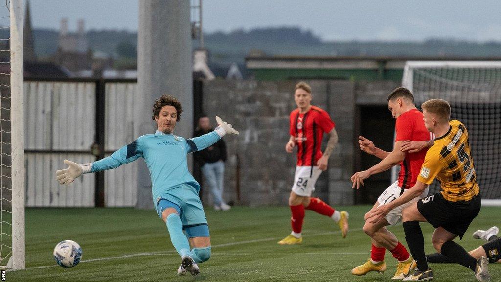 Clyde's Martin Rennie scores