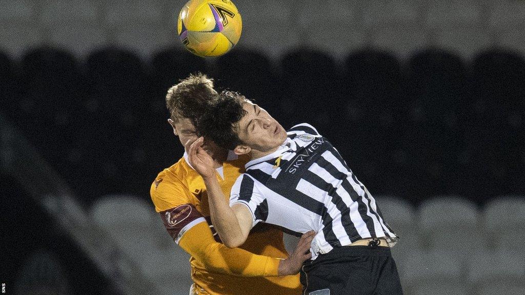 Mark O'Hara clashes heads with St Mirren's Jamie McGrath in January 2021