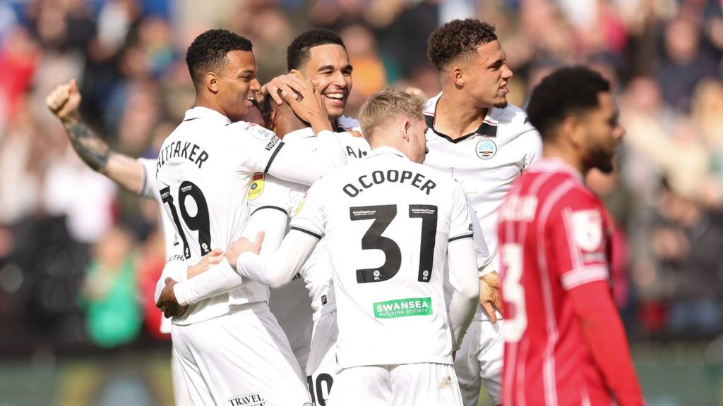 Swansea players celebrate