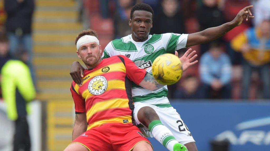 Partick Thistle's Ryan Stevenson is closely marked by Dedryck Boyata of Celtic