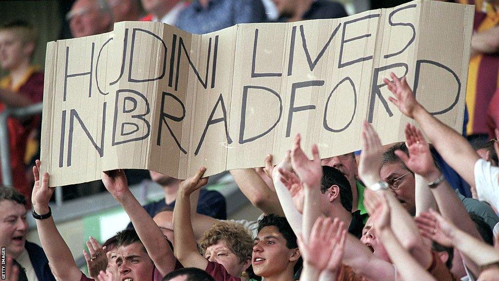 Bradford City fans celebrate staying in the Premier League