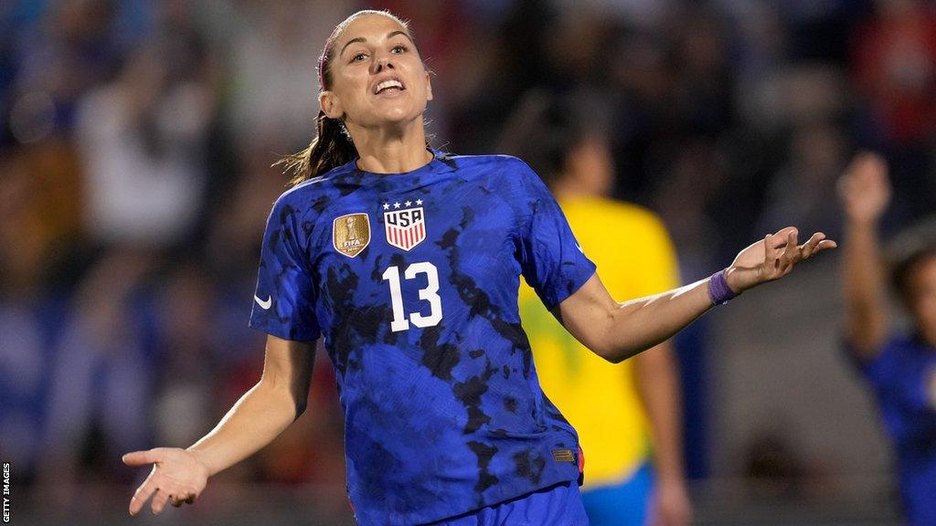 United States player Alex Morgan celebrates scoring a goal against Brazil