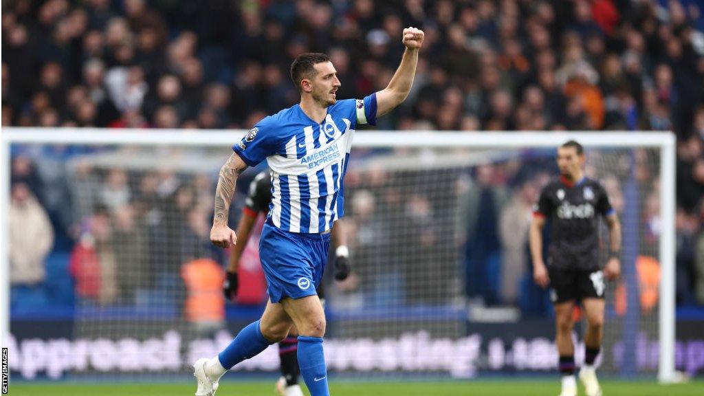 Lewis Dunk celebrates scoring for Brighton against Crystal Palace