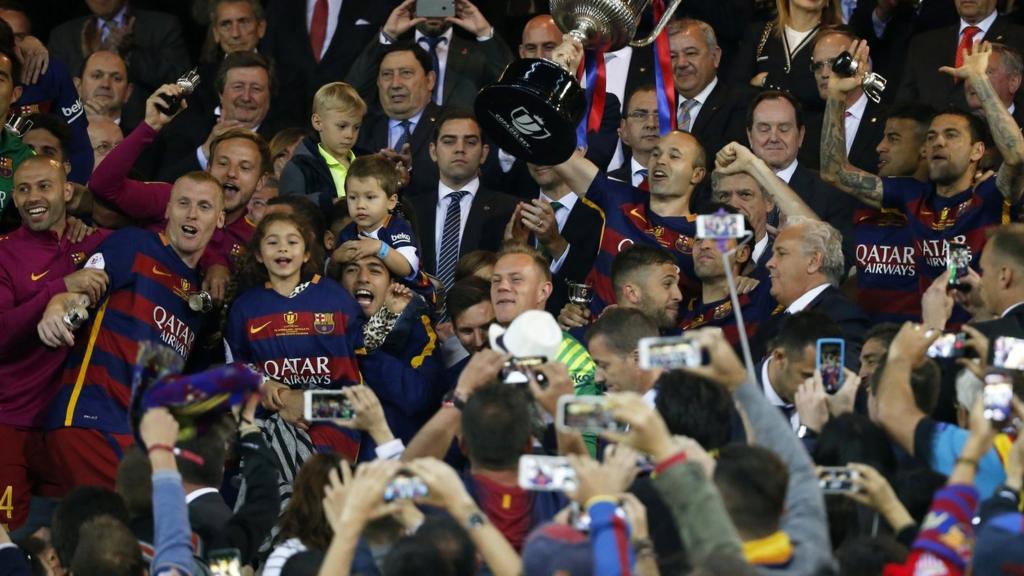 Andres Iniesta celebrates with the Copa Del Rey trophy